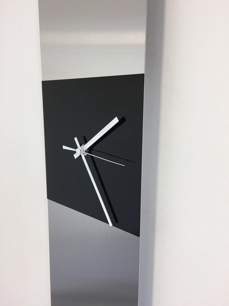 Wandklok Heart of the Sunrise Black Modern Desing