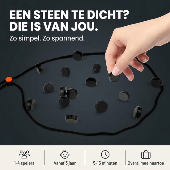 Hand pakt zwarte magneetsteen in een magnetisch spel met touw, 1-4 spelers, geschikt vanaf 3 jaar.