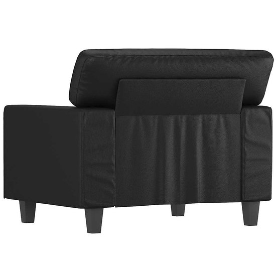 Zwarte fauteuil van kunstleer, van achteren gezien.