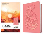 De Message Deluxe Gift Bible in roze met een gouden golfpatroon. Tekst van Eugene H. Peterson.