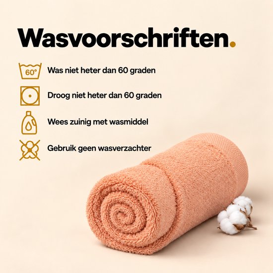 Oprolde zalmroze handdoek met wasvoorschriften: wassen en drogen tot 60 graden, zuinig met wasmiddel, geen wasverzachter.