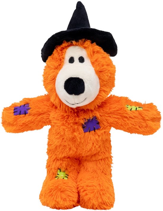 Oranje knuffelbeer met heksenhoed, paarse en groene patches op lichaam en poten.