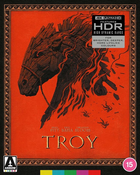 Leren hoes voor de film "Troy" met een getekend houten paard en kleine figuren op een rode achtergrond.