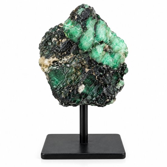 Émeraude brute sur un socle noir en métal, avec des cristaux verts voyants.