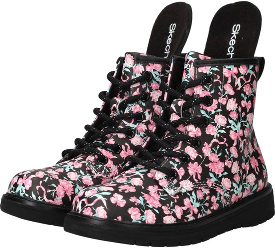 Zwarte laarzen met bloemenprint, roze strikken en lichte blauwe accenten. De Skechers logo's zijn zichtbaar op de binnenzool.
