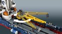 Close-up van de gele kraan van de LEGO Technic Oceaanonderzoeker die draait.