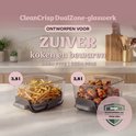 Twee glazen schalen van 3,8 liter met frietjes en kippenvleugels, met tekst 'Zuiver koken en bewaren, geen PFAS'.