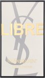 Witte doos met grote grijze YSL logo en gouden 'LIBRE' letters.