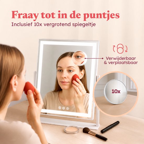 Vrouw gebruikt een rode make-up spons voor haar gezicht in een verlichte spiegel met 10x vergrotingsspiegel.