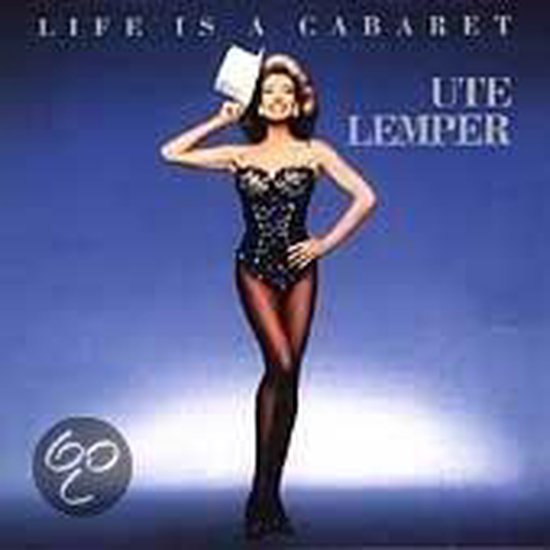 Ute Lemper in een zwart pailletten korset, panty's en een witte hoge hoed, met de tekst "LIFE IS A CABARET UTE LEMPER".