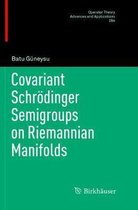 Covariant Schroedinger Semigroups on Riemannian Manifolds