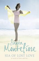 Een vrouw in een roze badpak staat op een strand met een gele sjaal in haar handen. "Santa Montefiore Sea of Lost Love"