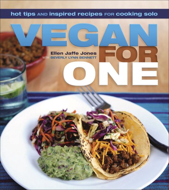 Boekomslag 'Vegan For One' met recepten voor één persoon, tonend veganistische taco's, salade en guacamole op een bord.