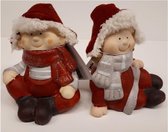 Set van 2 popjes kerstkinderen in winter kleding 13 cm hoog