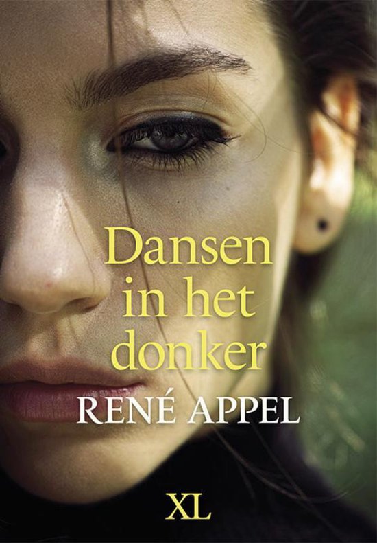 Boekcover met close-up van een gezicht en de tekst "Dansen in het donker RENÉ APPEL XL"