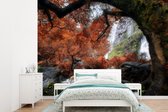 Behang - Fotobehang Een herfstachtige dag bij de waterval van het Klong Lan National Park - Breedte 360 cm x hoogte 260 cm
