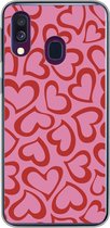 Geschikt voor Samsung Galaxy A40 hoesje - Een illustratie van behang met rode hartjes - Siliconen Telefoonhoesje