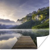 Poster Zonsopkomt boven het kalme landschap in Oostenrijk - 100x100 cm XXL