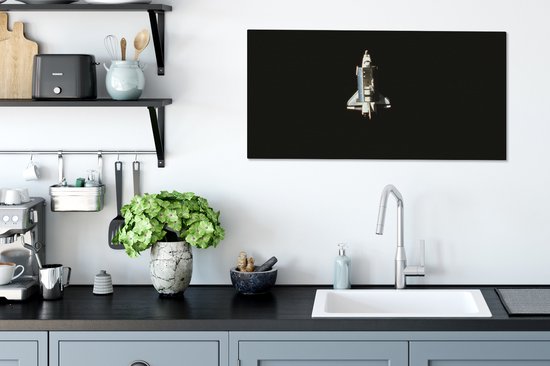 Tableau sur toile Une vue satellite d'une navette spatiale - 80x40 cm - Décoration murale