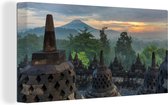 Canvas Schilderij Zonsopgang bij de tempel Borobudur in Indonesië - 80x40 cm - Wanddecoratie