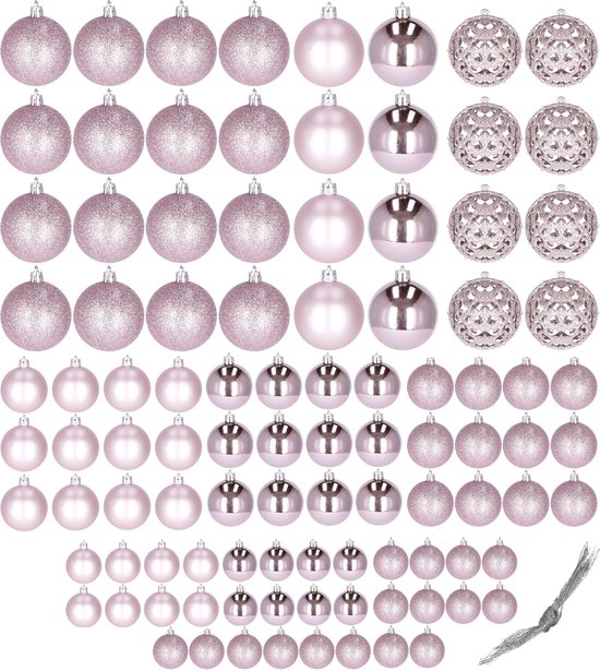 Een assortiment roze kerstballen in verschillende maten, afwerkingen en patronen.