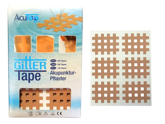 Doos AcuTop Gitter Tape met een vel van zes huidkleurige raster-tapes ernaast.