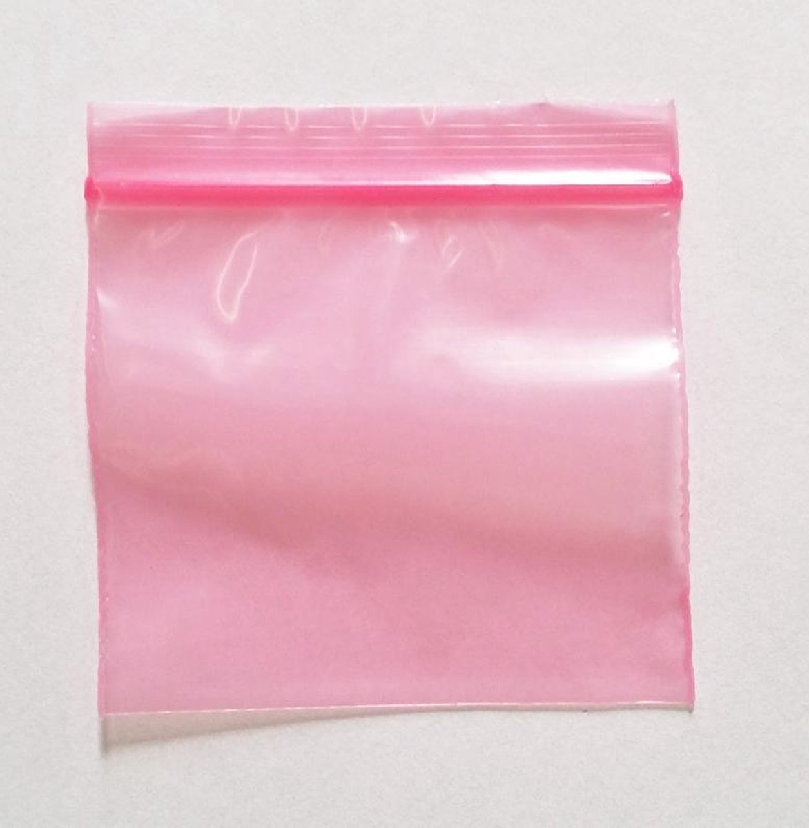 Gripzakje 50x50 mm Roze verpakt per 100 stuks