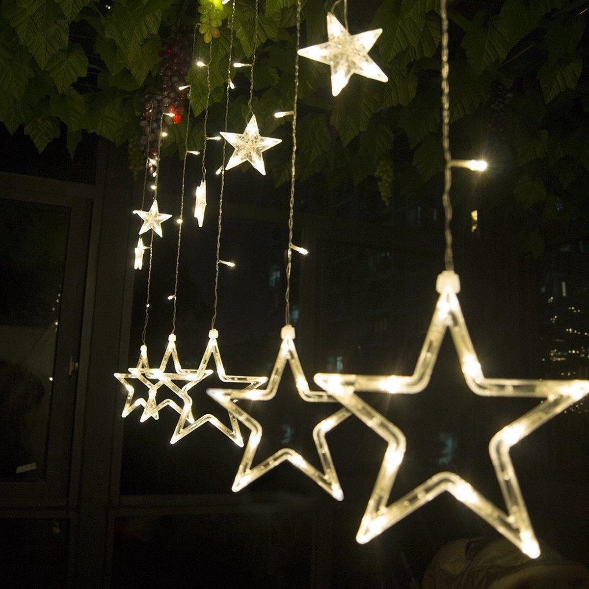 LED Sterrengordijn kerst - 12 sterren - warm wit - 138 leds | bol.com