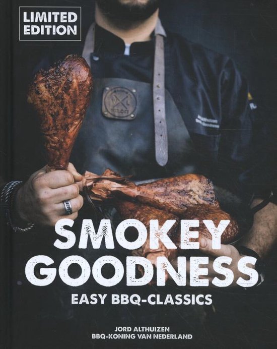 Boek 'Smokey Goodness' met de tekst 'LIMITED EDITION' en een chef die gegrilde kalkoenpoten vasthoudt.
