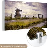 MuchoWow® Glasschilderij 40x20 cm - Schilderij acrylglas - Molen - Nederland - Water - Foto op glas - Schilderijen