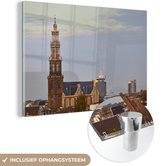 MuchoWow® Glasschilderij 150x100 cm - Schilderij acrylglas - Skyline van Amsterdam met de Westerkerk - Foto op glas - Schilderijen