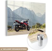 Moto sportive dans une région montagneuse Plexiglas 30x20 cm - petit - Tirage photo sur Glas (décoration murale en plexiglas)