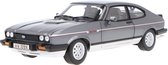 Het 1:18 gegoten model van de Ford Capri MKIII 2.8i RHD uit 1981 in grijs metallic De fabrikant van het schaalmodel is Norev. Dit model is alleen online verkrijgbaar