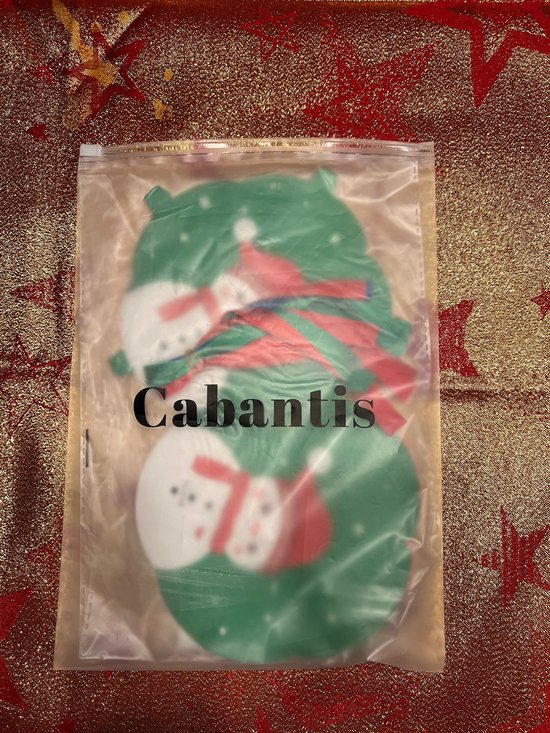 Doorzichtige verpakking met kerstthema decoraties, waaronder sneeuwpoppen. Cabantis logo.