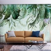 Fotobehangkoning - Behang - Vliesbehang - Fotobehang Groene Tropische Bladeren - Junlge - Botanisch - 100 x 70 cm