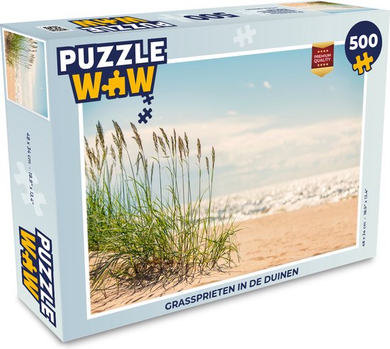 L'emballage d'un puzzle de 500 pièces intitulé 'GRASSPRIETEN IN DE DUINEN'.