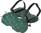 Groene gazonpriksandalen met metalen pinnen en verstelbare banden.
