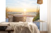 Fotobehang zonsondergang op het strand - 300x280cm