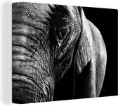 Canvas Schilderij Close-up van een olifant op een donkere achtergrond - zwart wit - 120x90 cm - Wanddecoratie