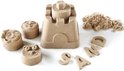 Château de sable kinetisch, deux visages, une forme de chat et les lettres S, A, N, D.