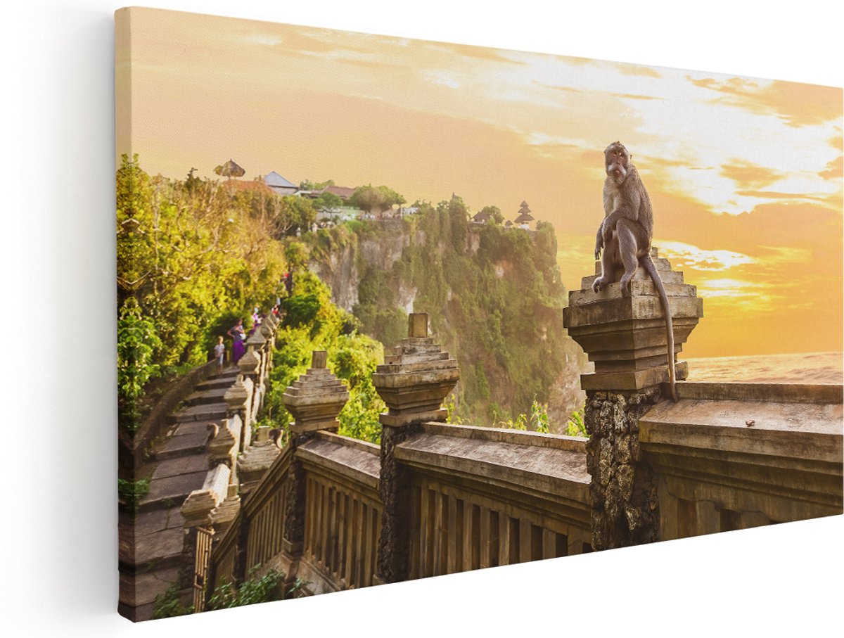 Artaza Canvas Schilderij Aap Op De Uluwatu Tempel In Bali - 180x90 cm - Groot - Wanddecoratie Woonkamer - Schilderijen - Muurdecoratie
