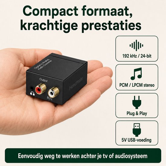 Hand met een zwarte digitale naar analoge audio converter van Handmate, met RCA uitgangen en hoofdtelefoonaansluiting.