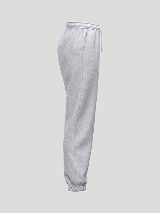 Lichtgrijze joggingbroek met trekkoord en elastische tailleband en broekspijpen.