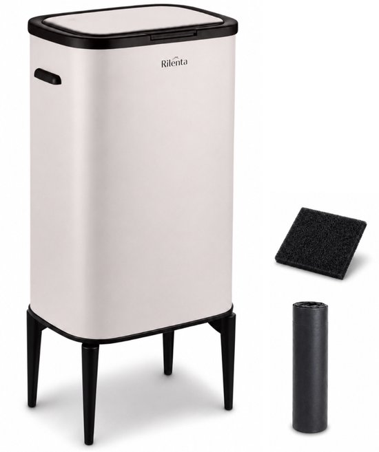 Poubelle Rilenta beige clair sur pieds noirs, avec filtre anti-odeurs et rouleau de sacs poubelles.