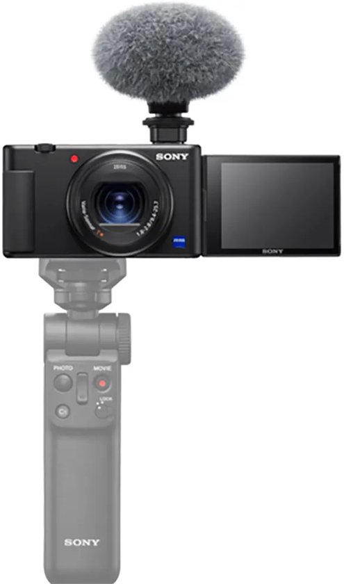 Zwarte Sony camera met microfoonkapje, klapscherm en tripod grip.