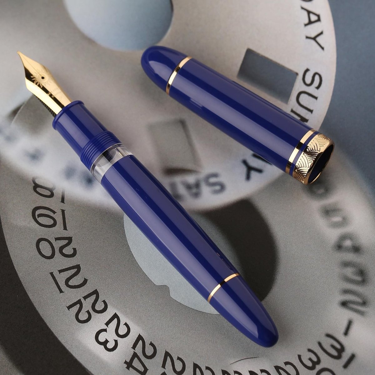 Prachtige vulpen met medium nib, koper zuigsysteem en grote capaciteit, blauwe acryl schrijfpunt in luxe verpakking