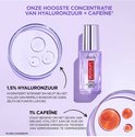 L'Oréal Paris Revitalift oogserum flesje met 1.5% hyaluronzuur en 1% cafeïne, met petrischalen die de ingrediënten tonen.
