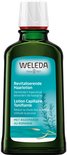 Groene fles Weleda Revitaliserende Haarlotion met rozemarijn, 100ml.