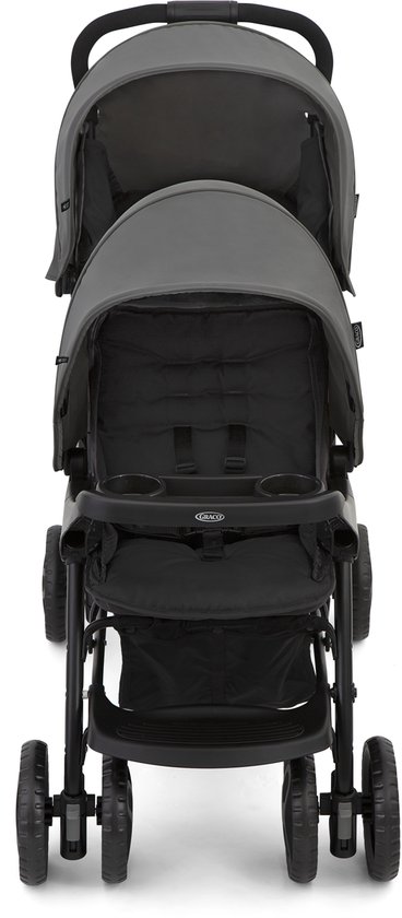 Grijze Graco tandem kinderwagen, voorkant, met twee zitjes, zonnekappen en bekerhouders.