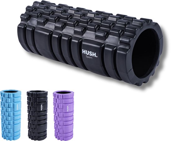 Zwarte HUSH Sport foamroller met noppenpatroon, met kleine blauwe, zwarte en paarse rollers eronder.